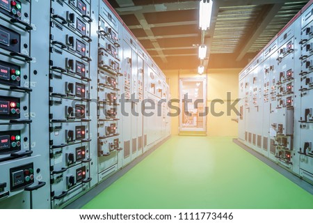 Electrical selector switch,button switch,Electrical switch gear at Low Voltage motor control center cabinet in coal power plant.