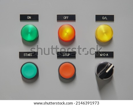 Electrical selector switch,button switch,Electrical switch gear at Low Voltage motor control center cabinet in coal power plant. blurred for background.
