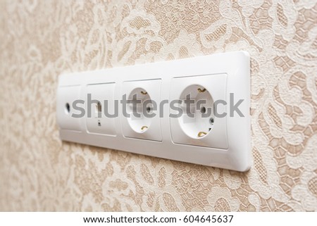 Electrical socket on a wall
