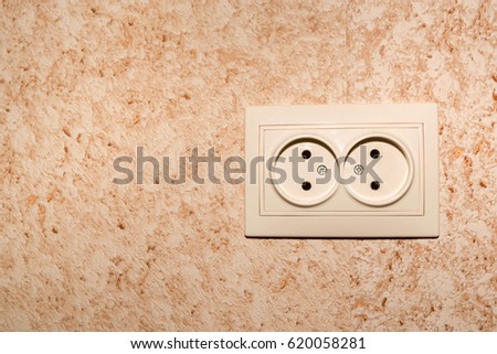 Electrical socket on a wall