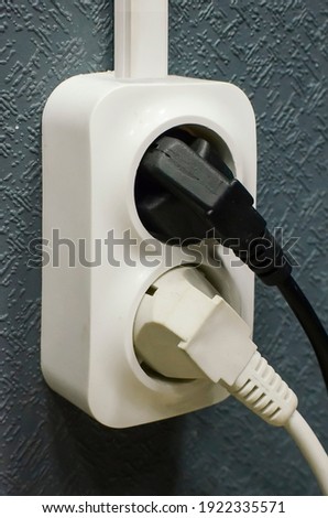 Electrical sockets on wall, close-up.