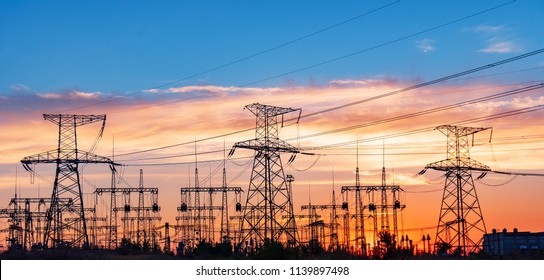 Electrical substation silhouette on the dramatic sunset background