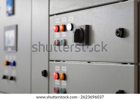 Electrical switchboard panel close up. Electric power distribution cabinets. Selective focus.