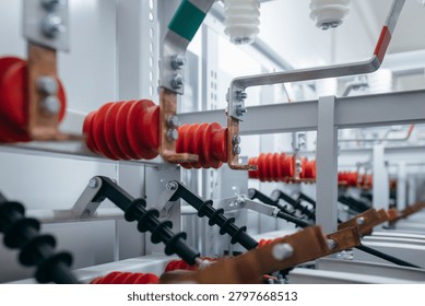 Electrical switchgear with copper busbars and insulators in a power substation
