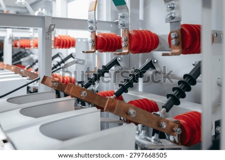 Electrical switchgear with copper busbars and insulators in a power substation