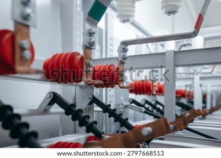 Electrical switchgear with copper busbars and insulators in a power substation