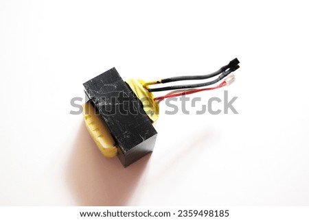 Electrical transformer on white background. Inverter UPS for power supply.
