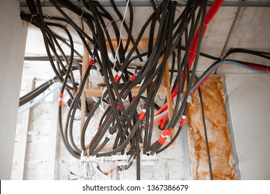 Electrical Wires Hanging Off The Ceiling