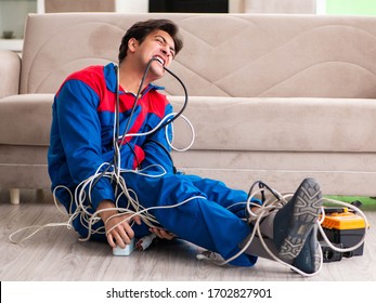 Electrician Contractor With Tangled Cables