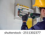 An electrician or an electrical engineer Install and test outlets and switches for electricity in houses and buildings.