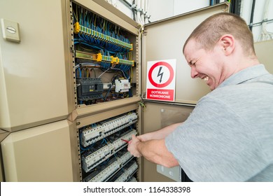 electrician electrocuted. grimace of pain on his face
