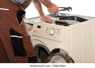 Electrician Is Repairing A Clothes Washer With Gripper