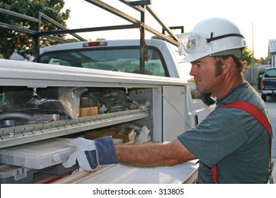 Electrician With Service Truck.