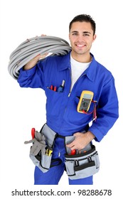 Electrician stood with cabling - Shutterstock ID 98288678