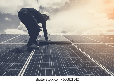 electrician team swapping and install solar panel ; electrician team checking hot spot on break panel - Shutterstock ID 650821342