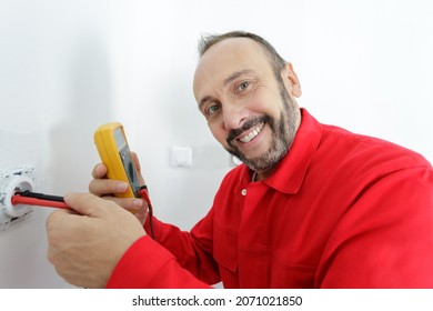 Electrician Technician At Work On A Residential Electrical Panel