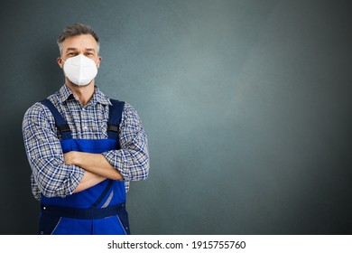 Electrician Workman Or Plumbing Repairman In Face Mask