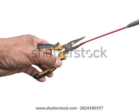 The electrician's hands, after using needle-nose pliers, are sprayed with cleaning solution. This is in the context of electrical installation and home repairs. White background.