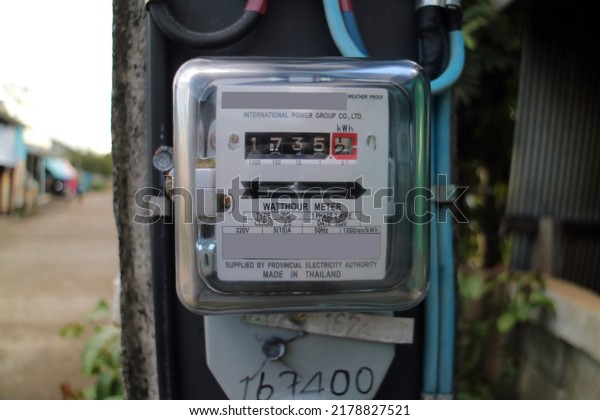 electricity\
consumption meter  attached to the\
house