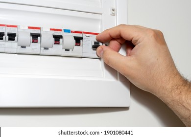 Electricity Distribution Box. Fuse Box. Man Doing Electrical Work