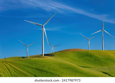 Electricity generation through wind power using wind turbines, eco-friendly tech, renewable energy source, Wind power generation produces no greenhouse gas emissions or air pollutants, climate change - Powered by Shutterstock