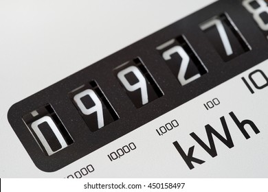 Electricity meter dial close-up and showing Kilowatt hour. - Shutterstock ID 450158497