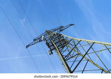 Electricity pole against the blue sky
