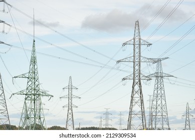 Electricity power line. Dramatic sky. Concept urban landscape. Energy, power generation, equipment, industry, environmental damage, pollution, ecology, supply, infrastructure - Shutterstock ID 2129309534