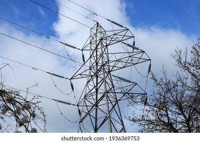 Electricity Pylon In Woodland, Hertfordshire, England, UK