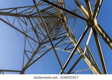 Electricity Towers or Electricity Pylons carrying high voltage electric power across Germany - Shutterstock ID 2144921917