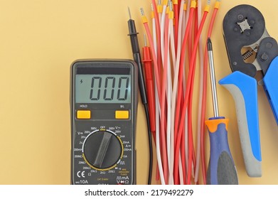 Electro Tools For Installation On A Colored Background Close-up.