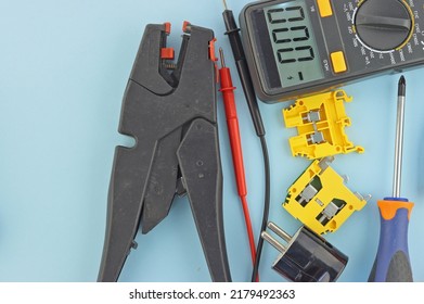 Electro Tools For Installation On A Colored Background Close-up.