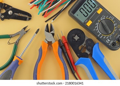 Electro Tools For Installation On A Colored Background Close-up.