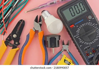 Electro Tools For Installation On A Colored Background Close-up.