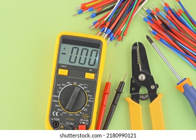 Electro Tools For Installation On A Colored Background Close-up.