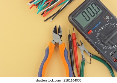 Electro Tools For Installation On A Colored Background Close-up.