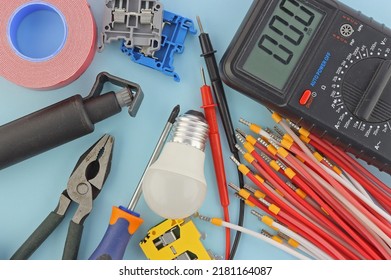 Electro Tools For Installation On A Colored Background Close-up.