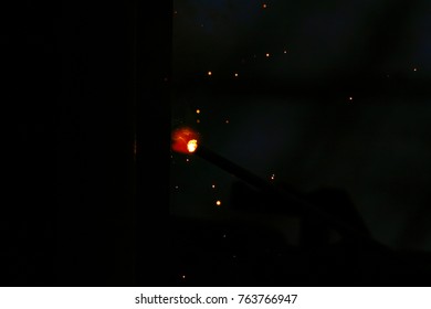 Electrode welding of metal structures. bright sparks.