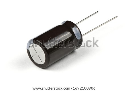 Electrolytic capacitor isolated on white background. High resolution photo. Full depth of field.