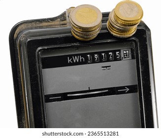 electromechanical electricity meter with the display indicating the kW consumed by the user and the euro coins above - Powered by Shutterstock - Get 15% off with code: PIKWIZARD15