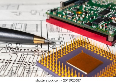 Electronic board, pen, processor  on the background of schematic circuit diagram and photomask for manufacture of printed circuit boards. Concept for development and design of electronic devices