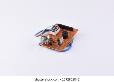 Electronic board with Potentiometer on the white background - Shutterstock ID 1592932042
