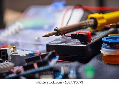 electronic board and tools repairs on black background - Shutterstock ID 1887790393
