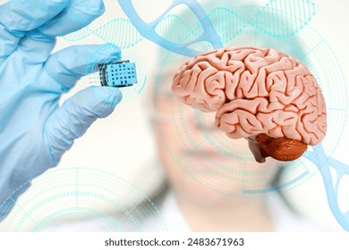 Electronic chip, bug in scientist's hand, Successful implantation of wireless chip into human brain, Cybernetics and Human Enhancement, Future of Brain-Computer Interfaces