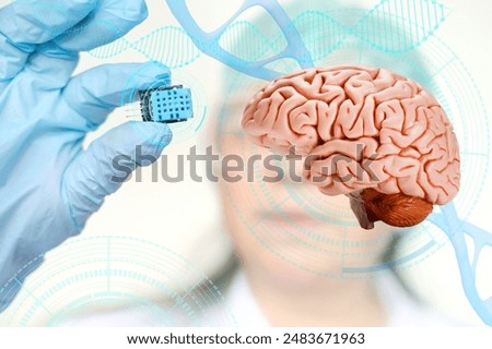 Electronic chip, bug in scientist's hand, Successful implantation of wireless chip into human brain, Cybernetics and Human Enhancement, Future of Brain-Computer Interfaces