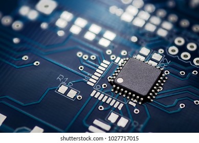 Electronic chip component on the blue printed circuit board