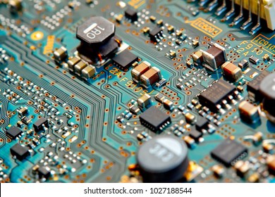 Electronic circuit board close up. - Shutterstock ID 1027188544