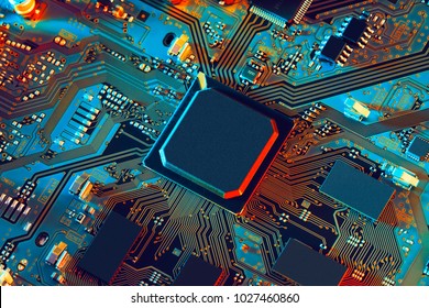 Electronic circuit board close up. - Shutterstock ID 1027460860