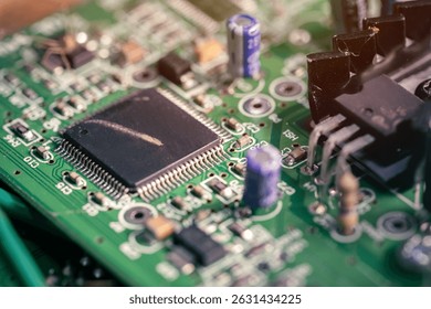 Electronic circuit board close up, green computer printed circuit board with processor, integrated circuits. - Powered by Shutterstock - Get 15% off with code: PIKWIZARD15