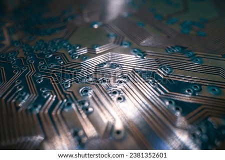 Electronic circuit board closeup. Electronic motherboard card. Circuitry and close-up on electronics. Background of electronics on board electrical circuits, technology texture.
